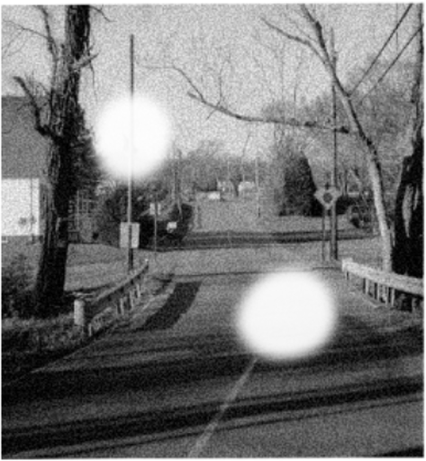 Two bright orbs down main street